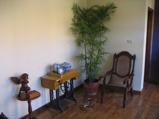Seating area & sewing table in hallway